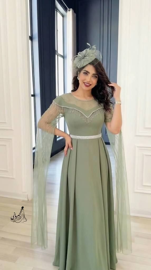 پیراهن مجلسی (فرشته) دیزاین شده با نگین دی ام سی و ریسه  قد حدود 152 بالاتنه استر داره کاپدار جنس : کرپ دالقیچ گرم بالا