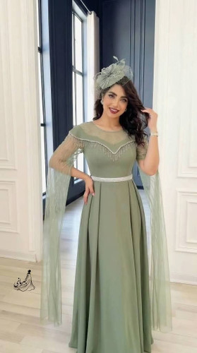 پیراهن مجلسی (فرشته) دیزاین شده با نگین دی ام سی و ریسه قد حدود 152 بالاتنه استر داره کاپدار جنس : کرپ دالقیچ گرم بالا