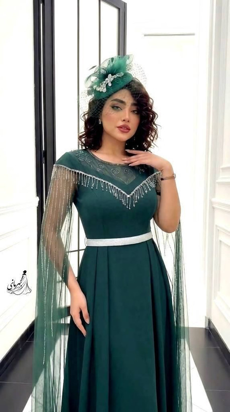 پیراهن مجلسی (فرشته) دیزاین شده با نگین دی ام سی و ریسه قد حدود 152 بالاتنه استر داره کاپدار جنس : کرپ دالقیچ گرم بالا